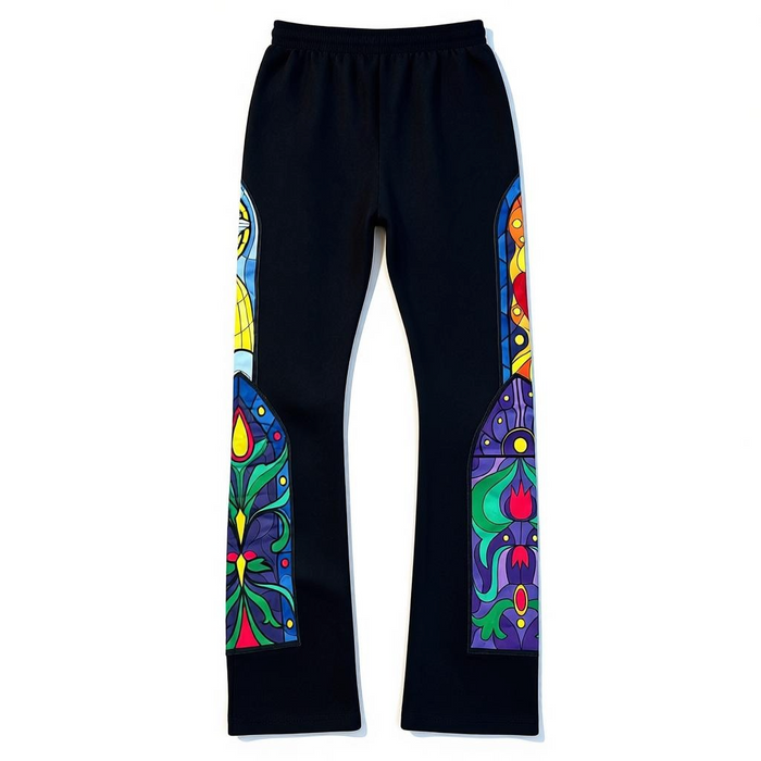 Black Pike stained glass stacked sweatpants in black, showing a relaxed fit and detailed design on the fabric.