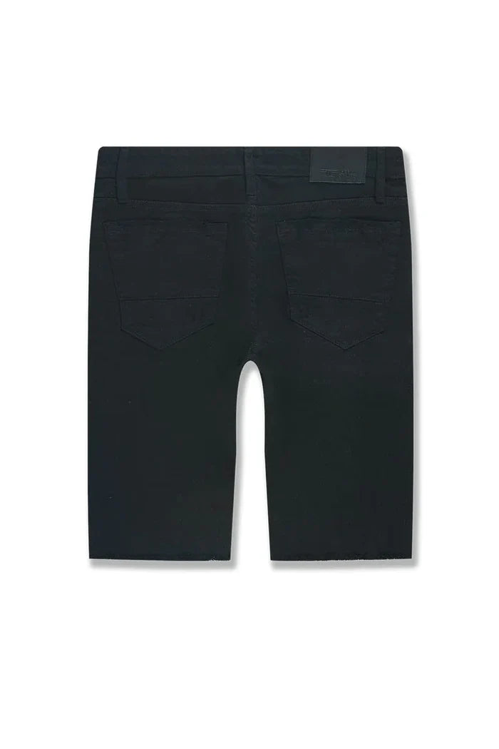 Jordan Craig OG Tulsa Twill denim shorts in jet black, stylish and comfortable for casual wear, shown on a model.