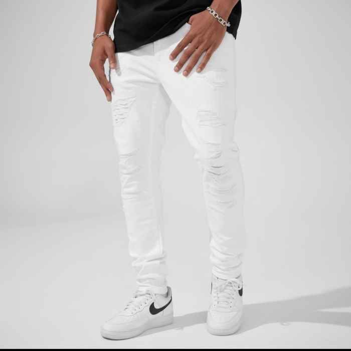 Jordan Craig Sean 'Alkaline' Fit white denim jeans with shredded details, showcasing a stylish, modern denim design.
