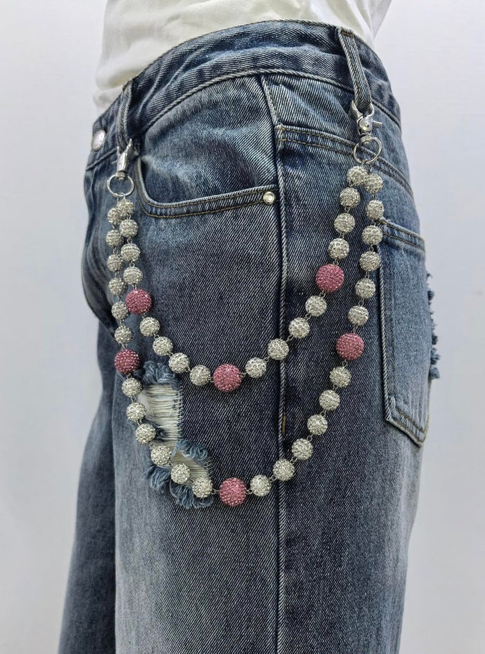 Pink and silver Kind Red rhinestone pocket chain accessory with sparkling rhinestones and metal chain design.