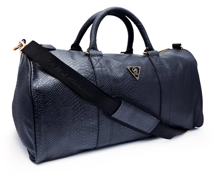 Black Mint Python duffle bag showing sturdy handles and spacious main compartment for travel and gym use.