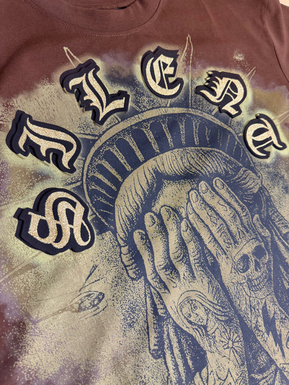 Rebel Minds Weeping Liberty brown cropped T-shirt featuring a graphic design on the front.