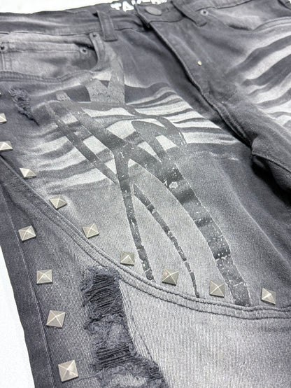 Taker Metal Studded Premium Stretch Stack Denim in black ash with metal stud embellishments, showcasing the fitted denim design.
