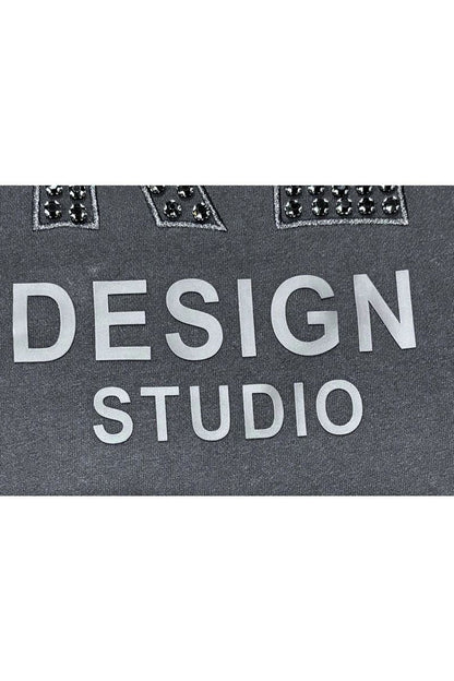 Black Label Black Studio T-Shirt in black, featuring a classic crew neck and minimalist design, made from comfortable cotton fabric.