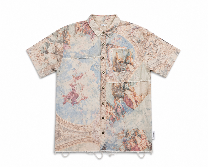 Copper Rivet men's Creation of Heaven & Earth khaki button-up shirt, showcasing the stylish design and fabric details.