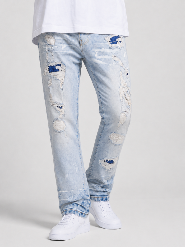 Copper Rivet rip and repair denim pants in LSB color, showcasing distressed details and classic denim style.