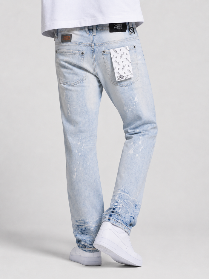 Copper Rivet rip and repair denim pants in LSB color showcasing distressed details and classic five-pocket design.