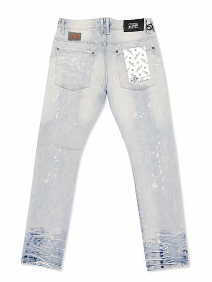 Copper Rivet denim pants with rip and repair details in LSB color, showcasing rugged style and distressed denim fabric.