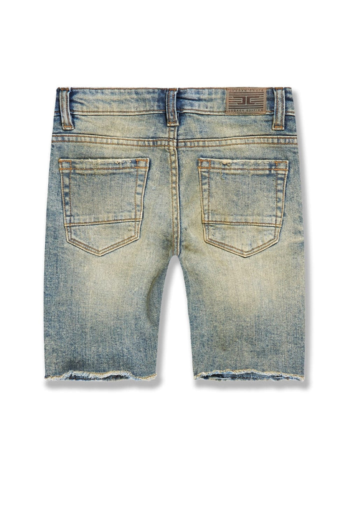 Jordan Craig Kids Arlington denim shorts in desert storm color, showing front view with rolled-up hem and classic five-pocket design.