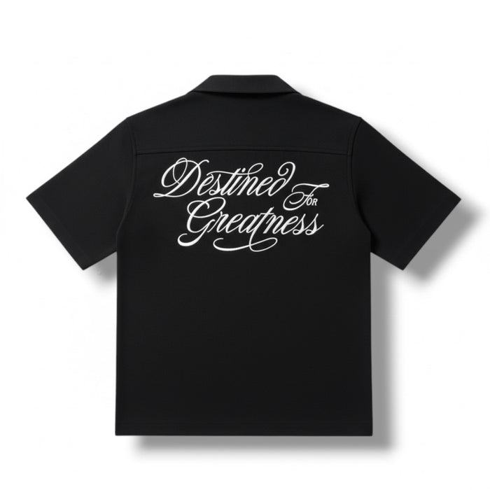 Jordan Craig Kids ‘Greatness Camp’ black short sleeve button-up shirt, stylish kids’ tee with a collared design.