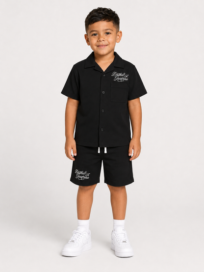 Black Jordan Craig Kids Greatness Camp shorts featuring a comfortable fit and sporty design for active children.