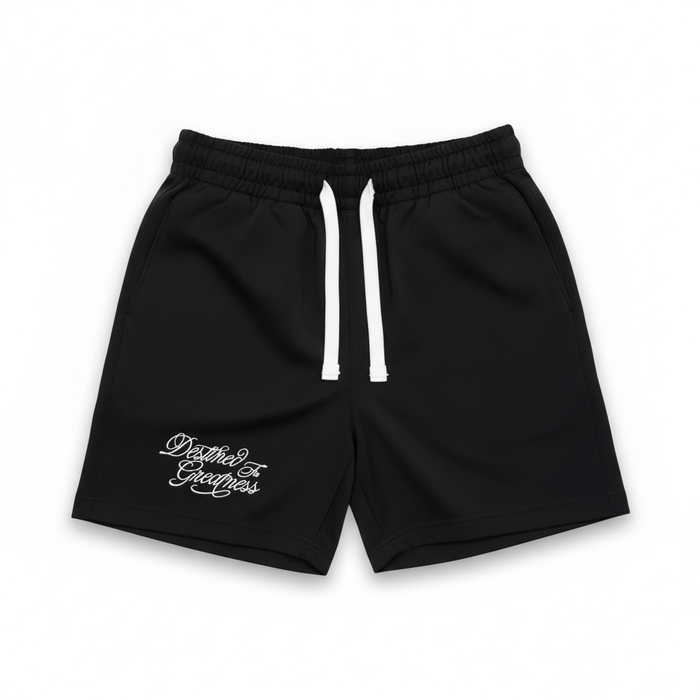 Black Jordan Craig Kids 'Greatness Camp' shorts with elastic waistband and side pockets, suitable for active children.