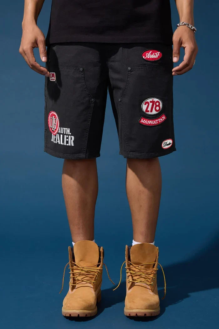 Black Jordan Craig 'Re-Up' shorts showing the relaxed fit and stylish design, perfect for casual wear or sports activities.