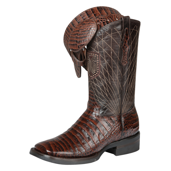 Brown cowboy boot with detailed pattern