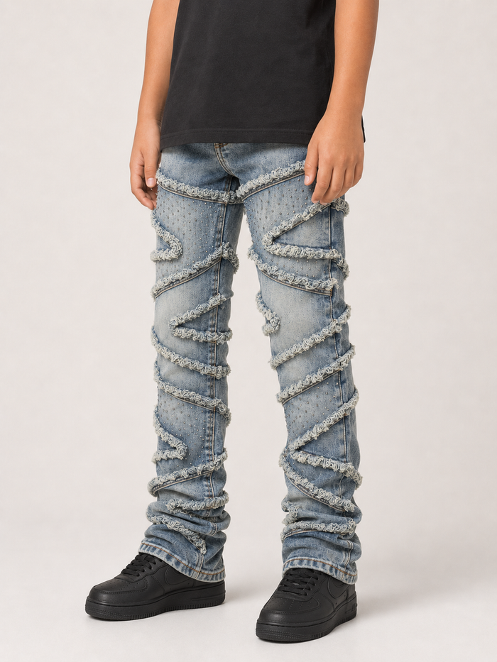 Light-wash FWRD Kids Stacked Slash denim jeans with a relaxed fit, featuring distressed detailing and classic five-pocket style.