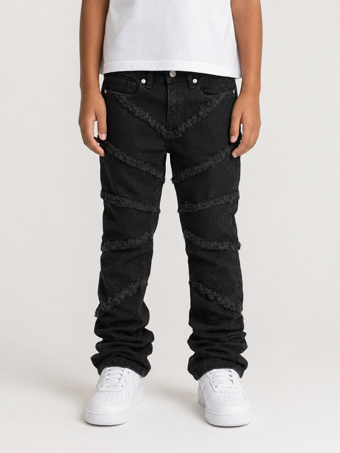 FWRD Kids Fray Crystal slim straight denim jeans in jet black displayed on a hanger.