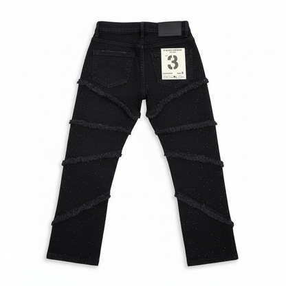 FWRD Kids Fray Crystal Slim Straight Denim in Jet Black, showing the dark black denim fabric with subtle fading and classic stitching details.