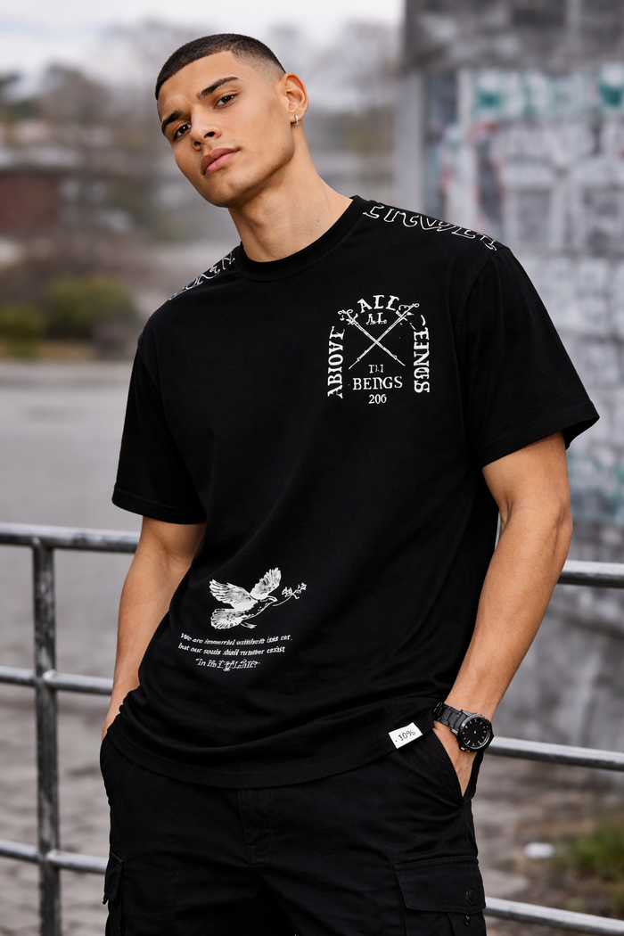 Black HIGHLY UNDRTD Above All T-Shirt laid flat, showcasing the minimalist design and high-quality fabric.
