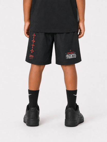 Black and silver kids' shorts from Highly Undrtd Kids' Rise Above collection, featuring a comfortable fit and stylish design.