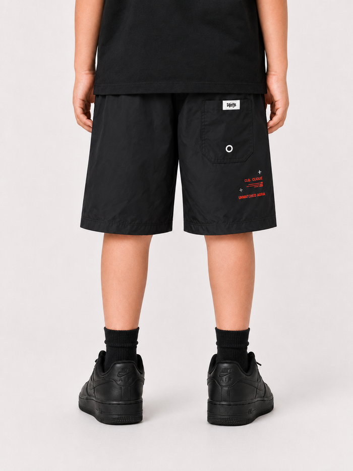 Black and red Highly Undrtd Kids "The Almighty" shorts featuring a sporty design and comfortable fit for children.