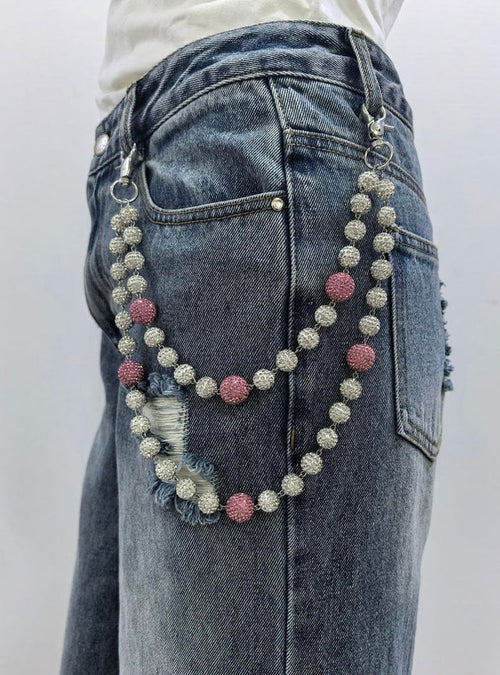Pink and silver Kind Red rhinestone pocket chain accessory with sparkling rhinestones and metal chain design.