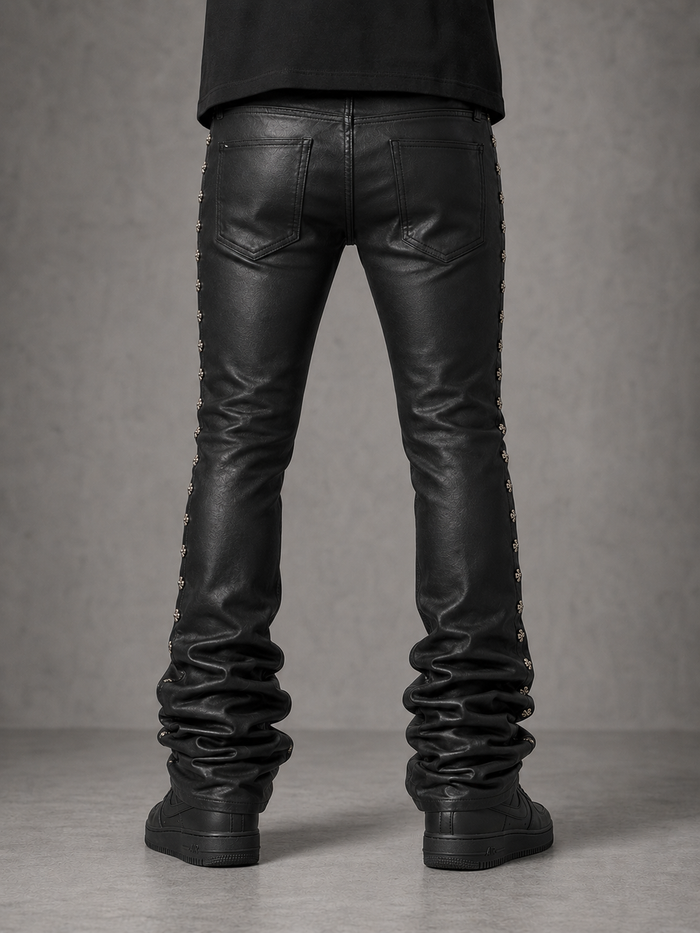 Kindred coated stud stacked denim jeans with distressed details and silver stud accents, showcasing a trendy denim style.