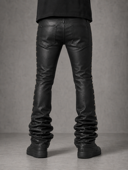 Kindred coated stud stacked denim jeans with distressed details and silver stud accents, showcasing a trendy denim style.