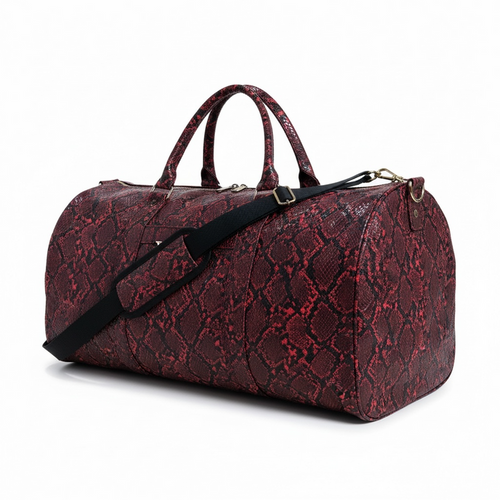 Red Mint Cobra duffle bag with sturdy handles and zipper closure, showcasing its spacious design and stylish accessory features.