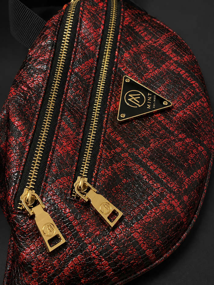 Red Mint Cobra leather fanny pack with adjustable strap and compact design, perfect for casual wear and convenience.