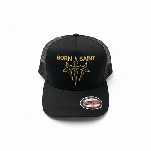 Black MUKA Born Saint trucker hat with mesh back and curved brim, casual accessory for streetwear style.