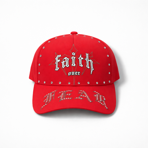 Red MUKA Faith Over Fear stone snapback hat with embroidered front design, adjustable strap, and flat brim.