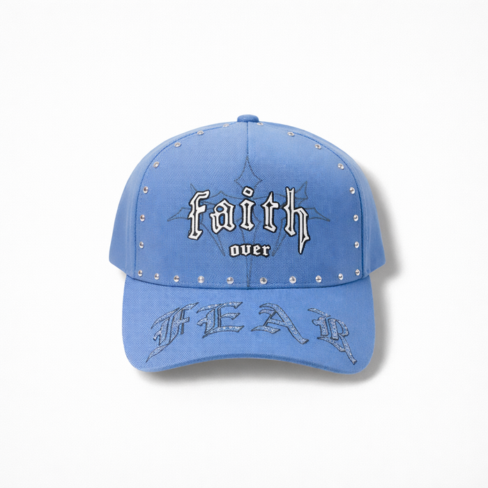 MUKA Faith Over Fear stone snapback hat in sky blue, showing front view with adjustable strap and embroidered logo.