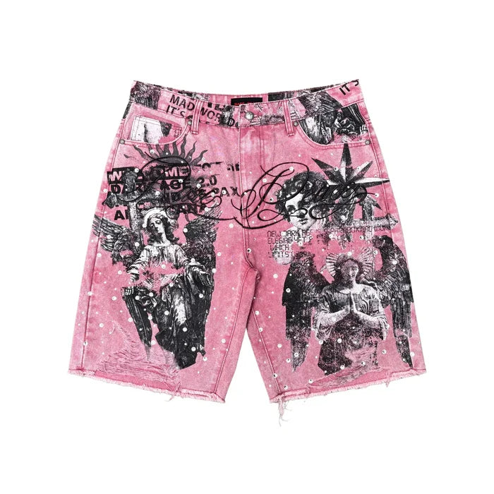 Dust pink denim shorts by Rare Peace featuring a digital print with rhinestones and the message "It's ok to cry" on the front.