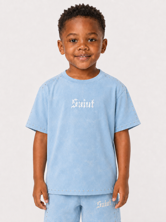 Light blue Rebel Minds Kids Saint T-shirt featuring a stylish design, perfect for children’s casual wear.
