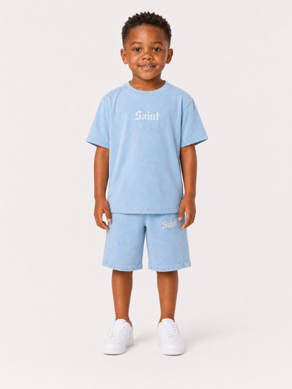 Light blue Rebel Minds Kids 'Saint' T-shirt featuring a stylish graphic design on the front.