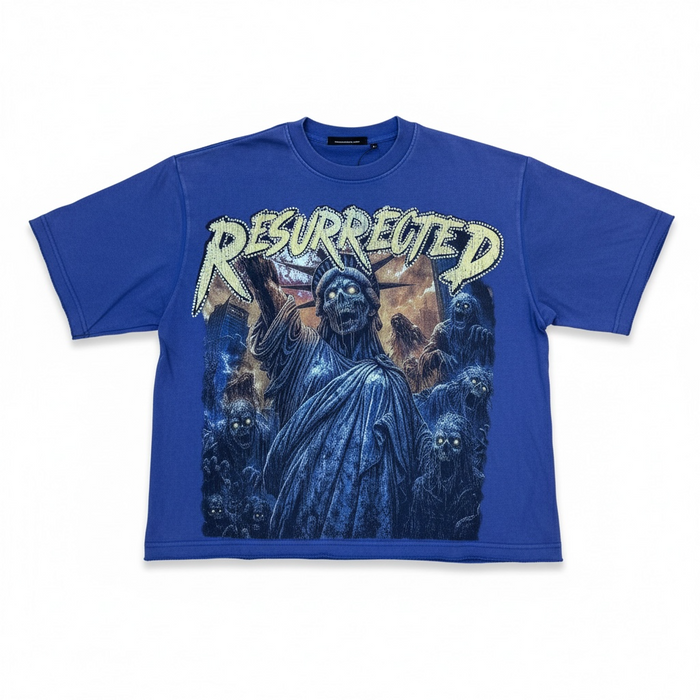 Royal blue Rebel Minds Resurrected cropped T-shirt featuring a front graphic design, short sleeves, and a relaxed fit.