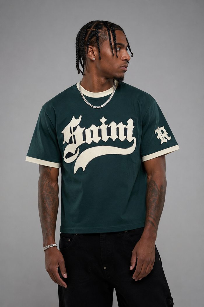 Rebel Minds Saint Chenille Ringer T-Shirt in hunter green, featuring a classic ringer design and embroidered logo on the front.
