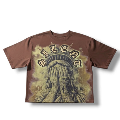 Rebel Minds 'Weeping Liberty' cropped brown T-shirt featuring a graphic print of the Liberty statue on the front.