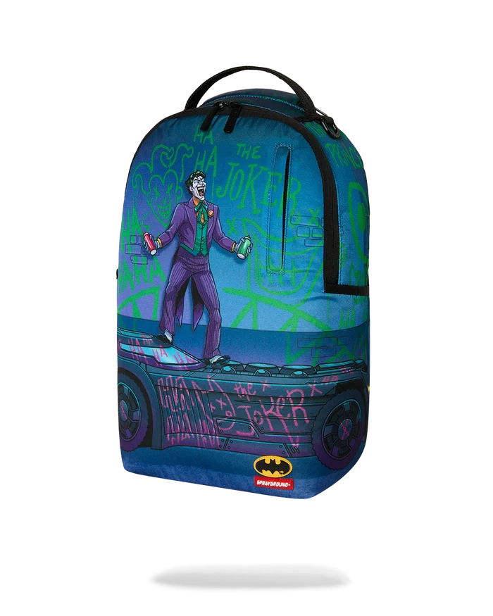 Sprayground DC Joker No Rules backpack featuring comic-style Joker design, adjustable straps, and bold logo details.