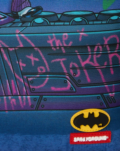 Sprayground DC Joker No Rules backpack featuring bold Joker graphic and adjustable straps, perfect for accessories and everyday use.