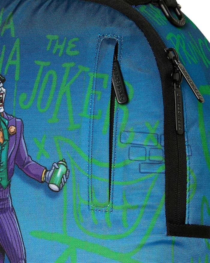 Sprayground DC Joker No Rules backpack featuring comic-style Joker design and adjustable straps.