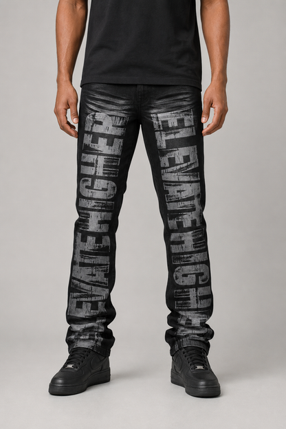Black Ash Taker all-over print premium stretch stacked denim jeans, showcasing detailed design and texture.