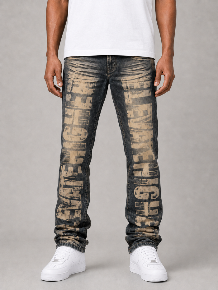 Dark indigo Taker stacked denim jeans with all-over print and premium stretch fabric, showcasing the stylish design and fit.