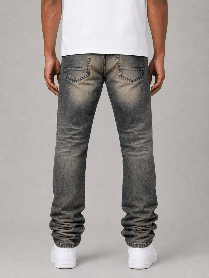 Dark indigo Taker stacked denim jeans with all-over print, featuring premium stretch fabric and a modern, stylish fit.