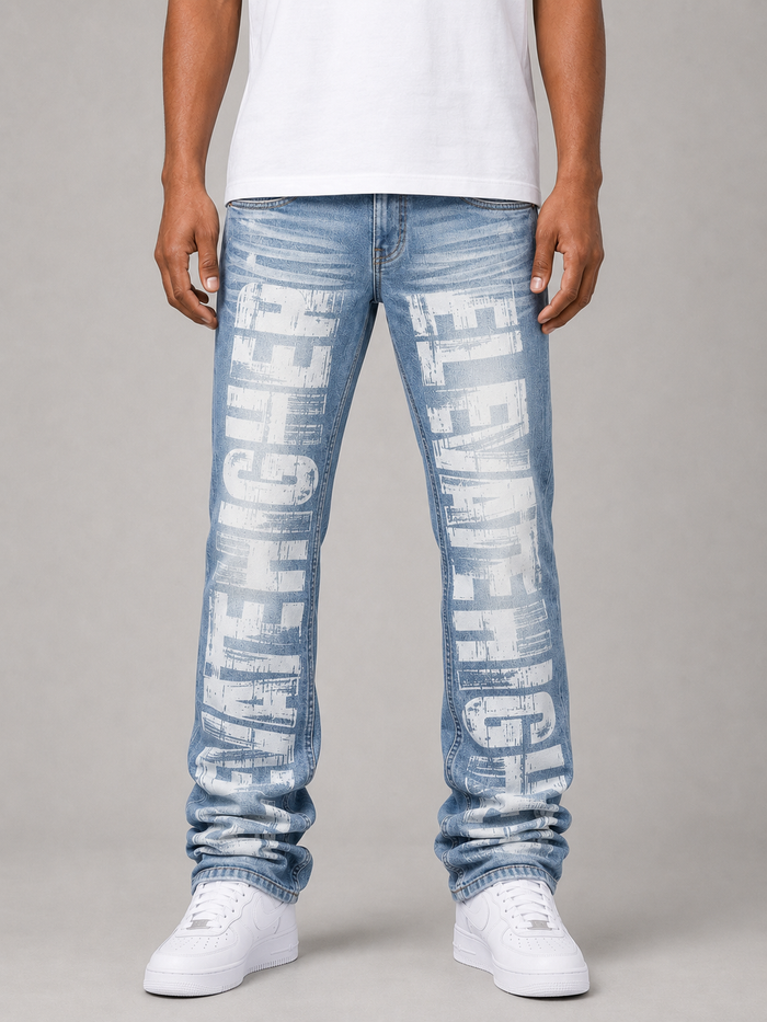 Taker all-over print premium stretch stacked denim jeans in light blue with detailed stitching and design features.