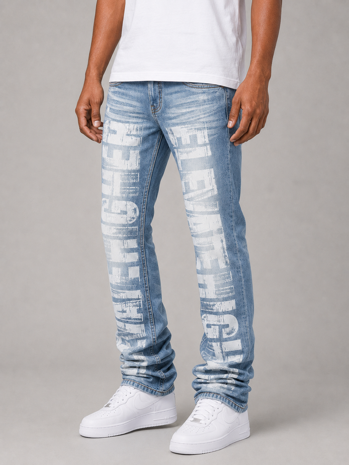 Taker all over print premium stretch stacked denim jeans in light blue, showcasing the detailed design and fabric texture.