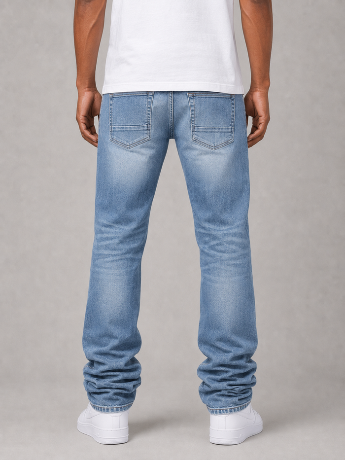 Light blue Taker stacked denim jeans with all-over print, premium stretch fabric, and a modern, fitted design.