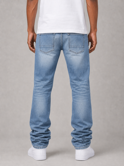 Light blue Taker stacked denim jeans with all-over print, premium stretch fabric, and a modern, fitted design.