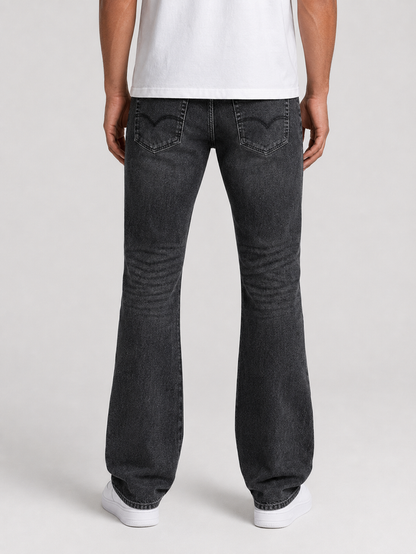 Taker 'Frayed Patched' Premium Stretch Stack Denim in Vintage Black, showcasing distressed fabric and layered denim design.