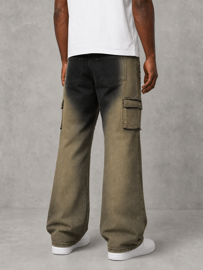 Taker Metal Stud Premium Stretch Cargo Jeans in Mud Black stacked denim with metal stud accents and rugged design.
